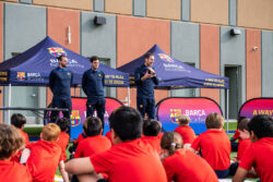 Coaches addressing athletes at soccer camp