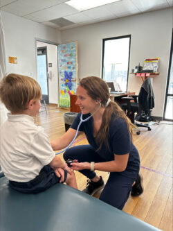 School nurse helping student