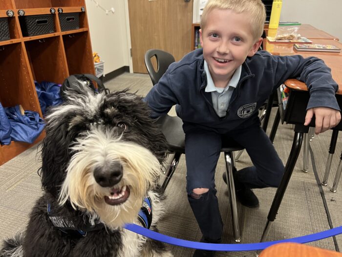 Archway Glendale Therapy Dog with a student