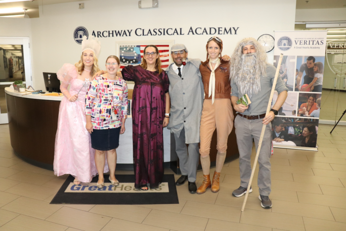 Faculty in costume for Great Hearts, Great Books Day