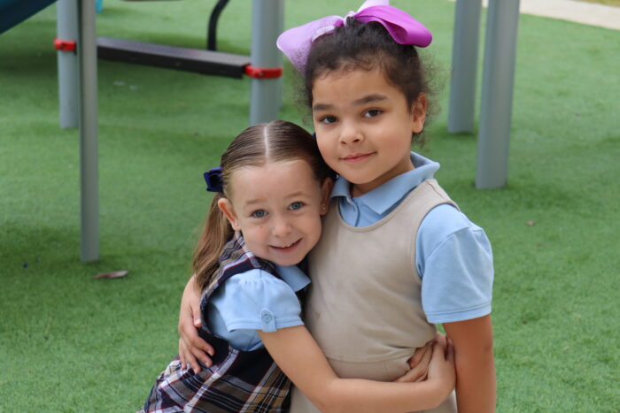Two Harveston students on playground