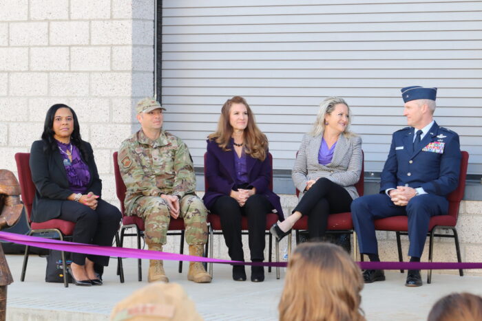 Speakers at the Purple Star School ribbon-cutting ceremony