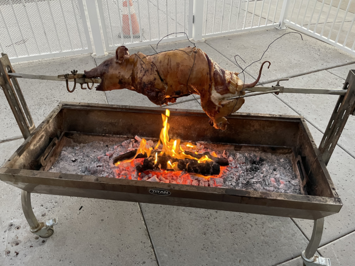 A roasted pig on a spit