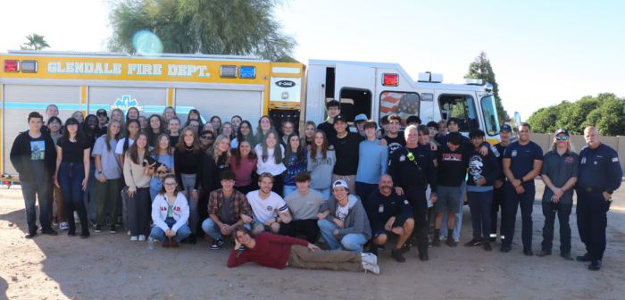 Glendale Prep students in front of a fire engine