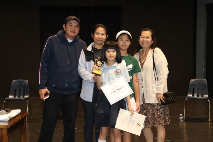 Winning speller at the Spelling Bee with her family