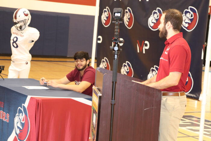 RJ and head coach at Signing Ceremony