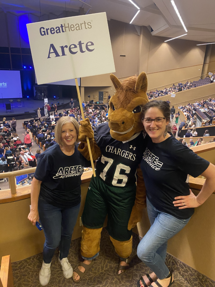 Arete campus staff with mascot at the 2024 Summit