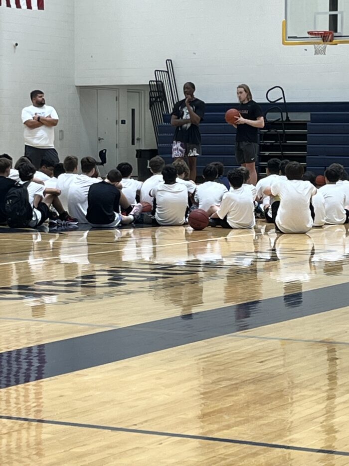 Jalen Williams speaking to Lincoln Prep athletes at Summer Basketball Camp