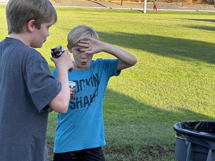 North Phoenix Prep runners guzzling down root beer at the annual Root Beer Mile