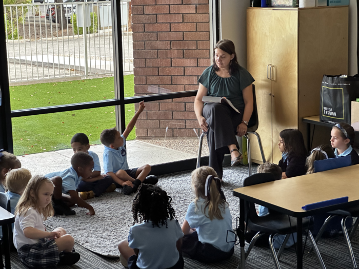 Kindergarten students at circle time with teacher