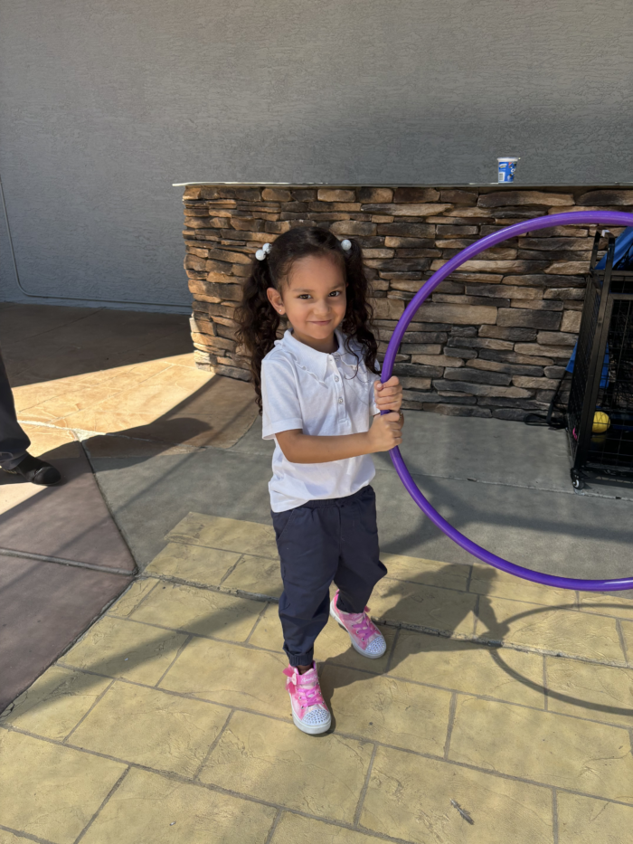 Great Hearts Catalyst student playing with hula hoop