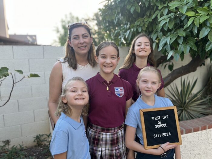 Erin Lentz and her children on the first day of school