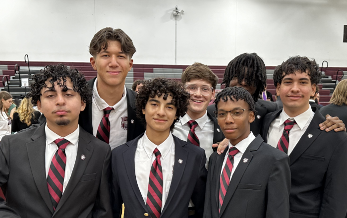 Group of male students with blazers and ties