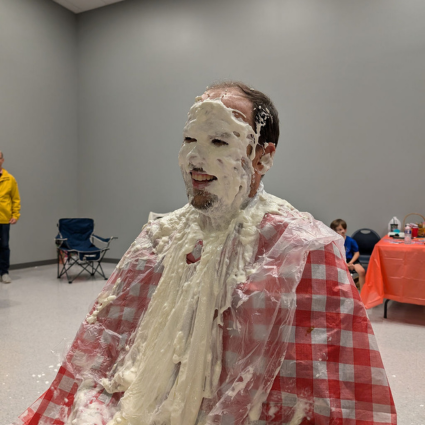 Head of School with pies-to-the-face