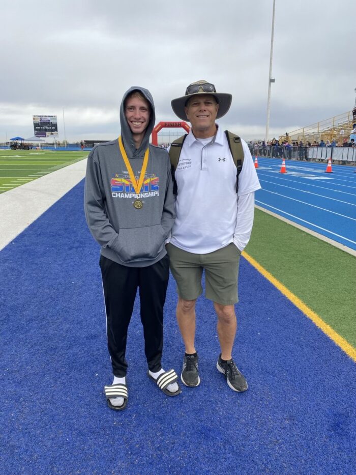 Cross-country athlete with his coach