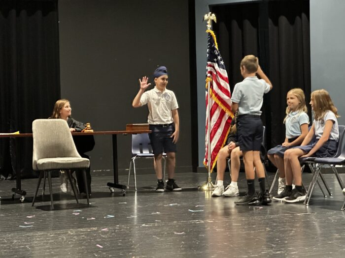 Students participating in courtroom mock trial