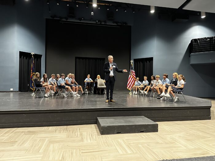 judge speaking to a group of students