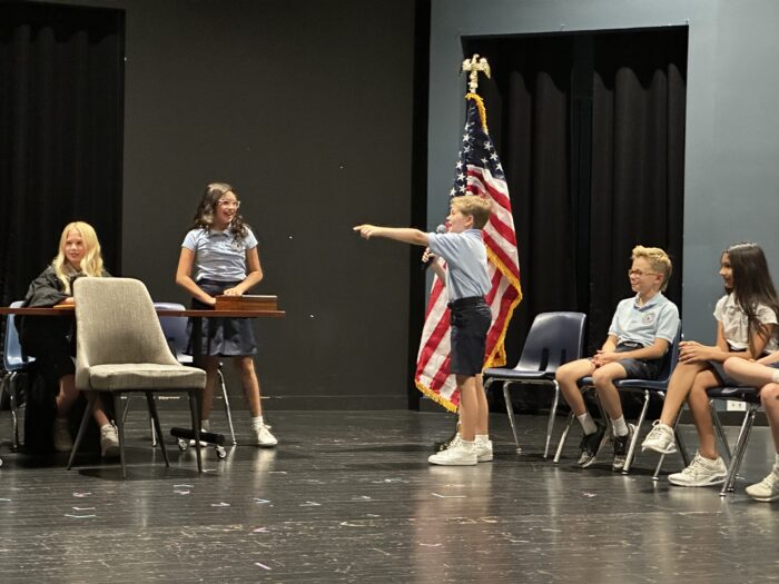 Students participating in a courtroom mock trial