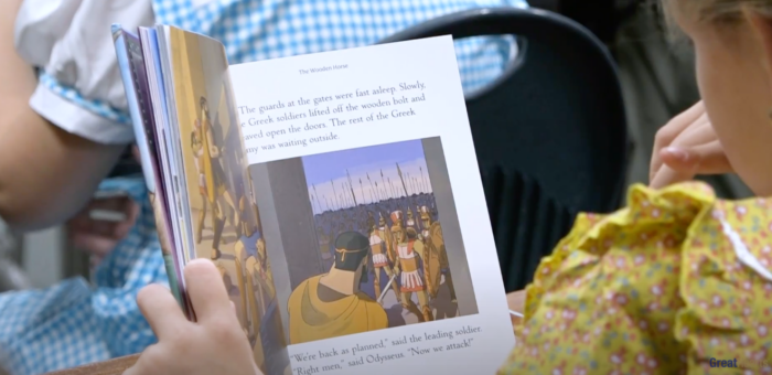 Child reading a book