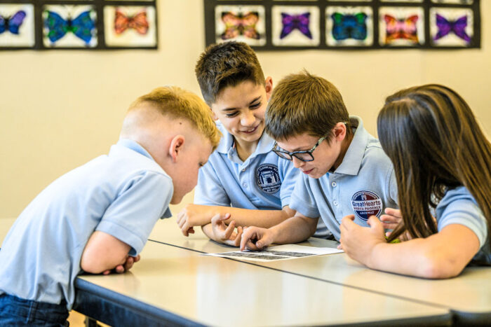 students working on a project together at a table