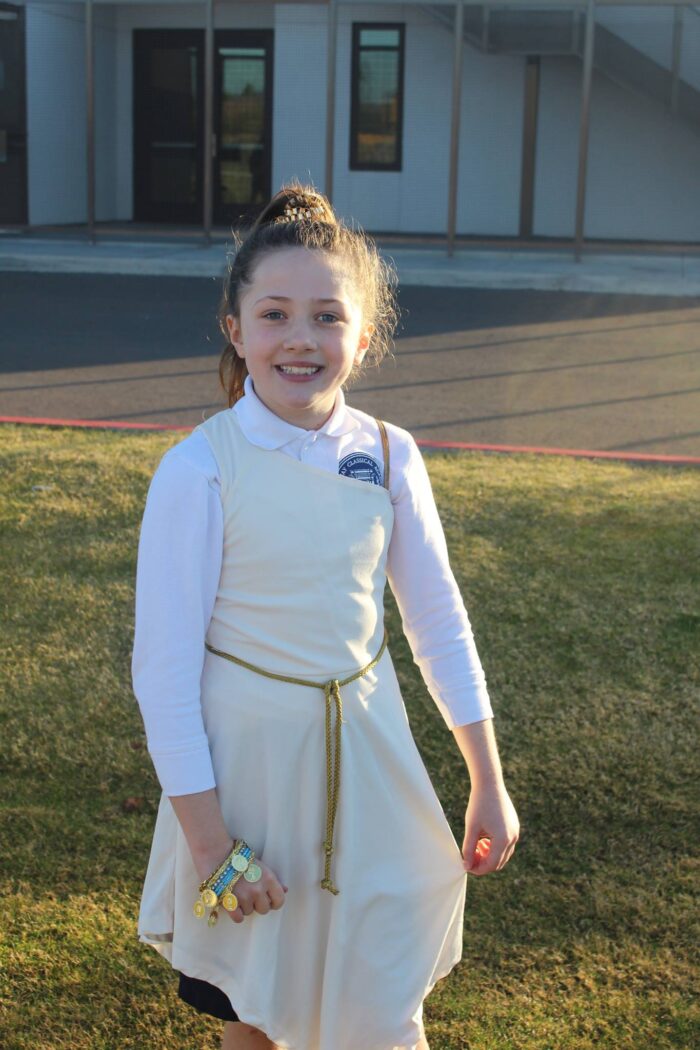 Archway student in a tunic