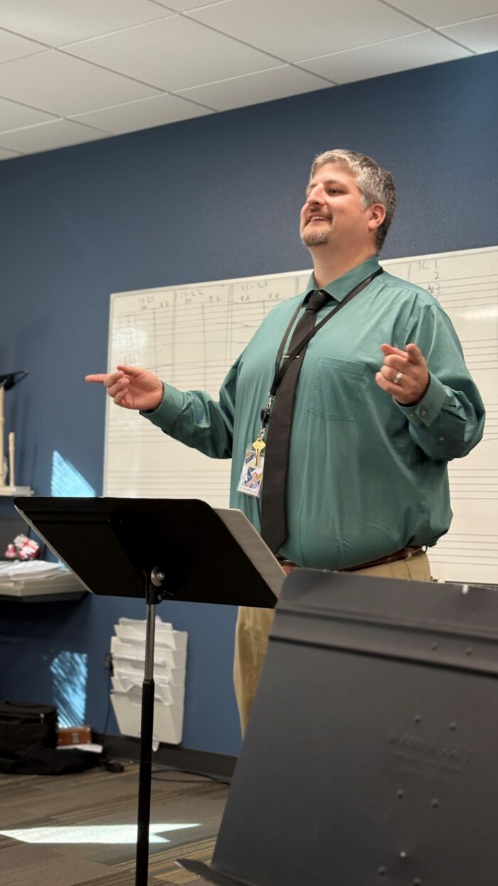 Dr. Rodriguez conducting a band class