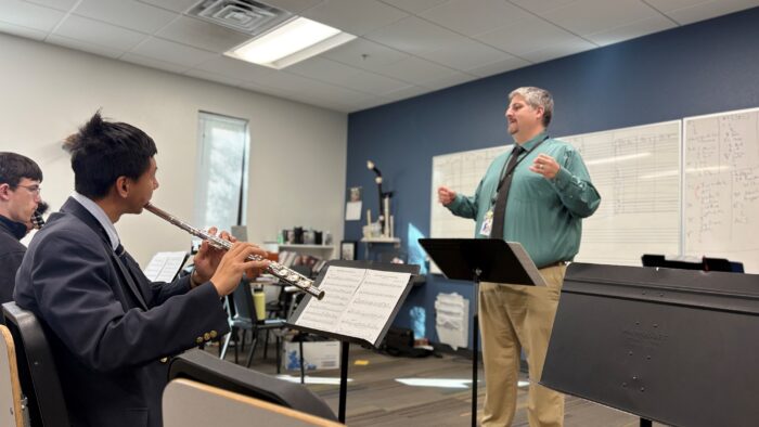 Dr. Rodriguez conducting a band class