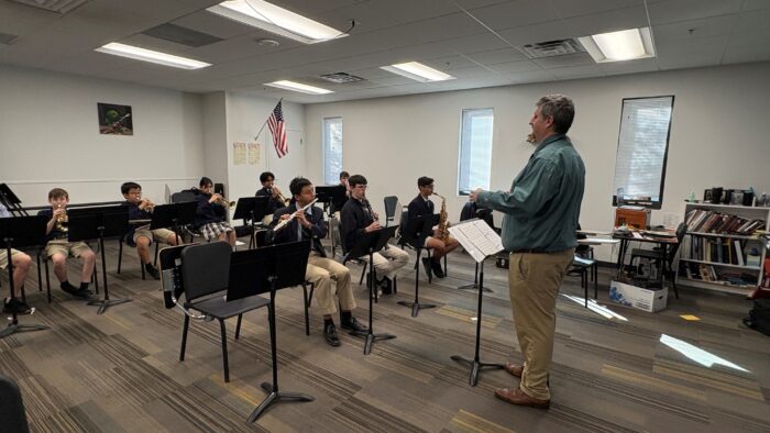 Dr. Rodriguez conducting a band class