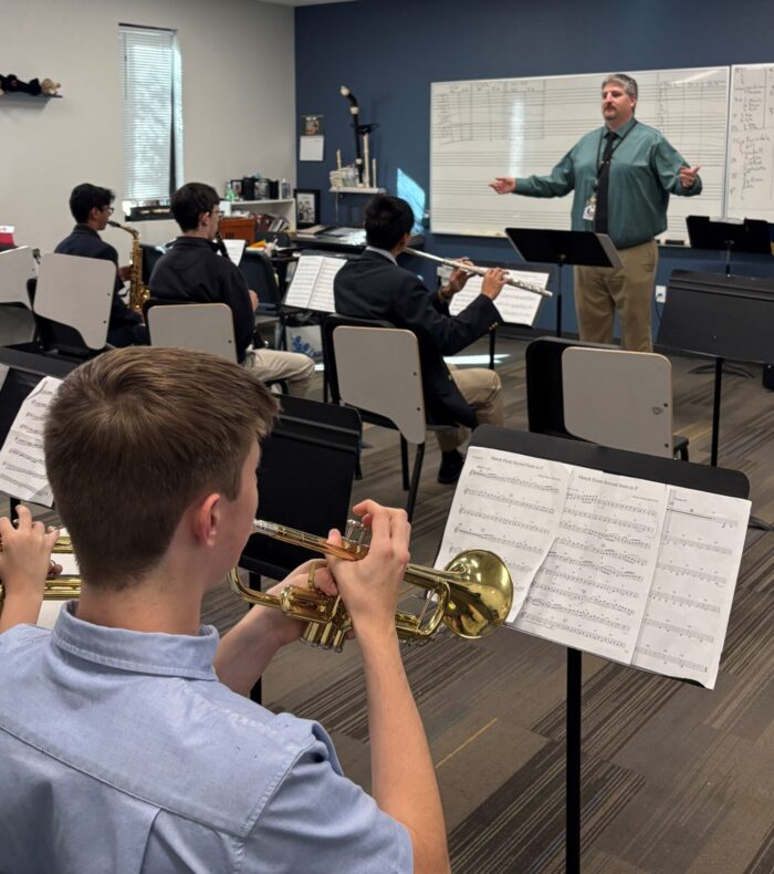 Dr. Rodriguez conducting a band class