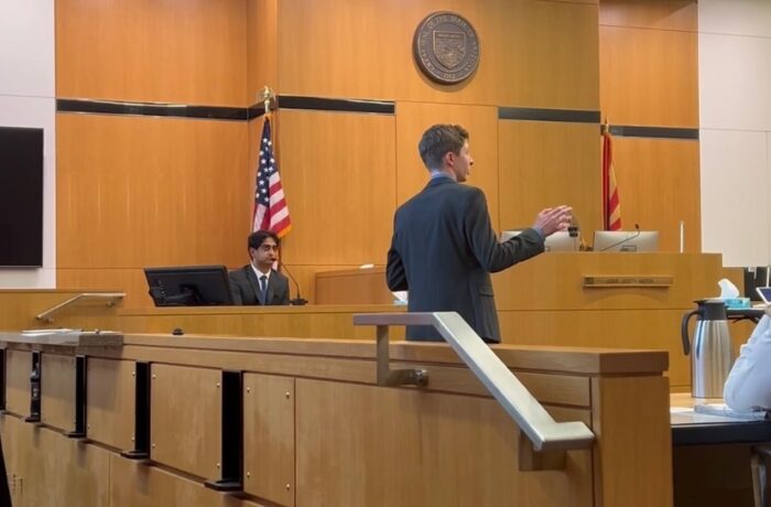 Lincoln Prep student in a courtroom during a mock trial