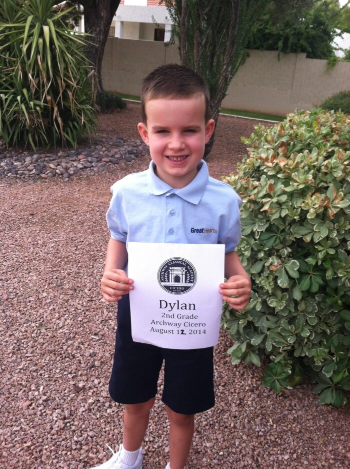 Young student posing for first day of school picture