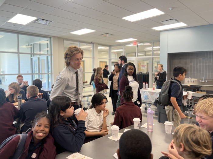 Students and faculty member at "Cocoa with the Head of School"