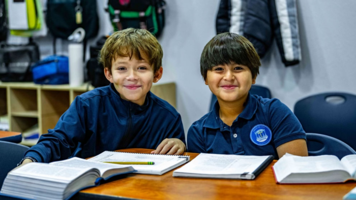 Two students sitting at a desk