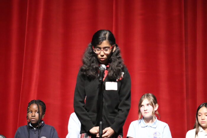 Student at a microphone