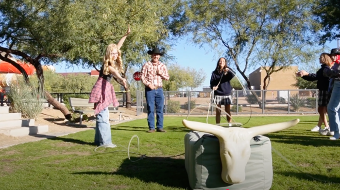 Students practicing roping techniques