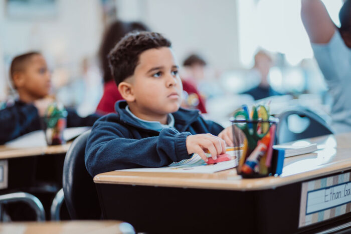 Student sitting at a desk