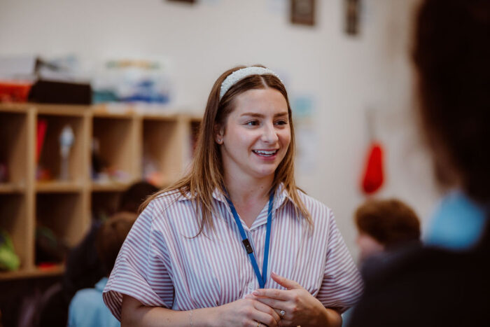 A teacher in a classroom.