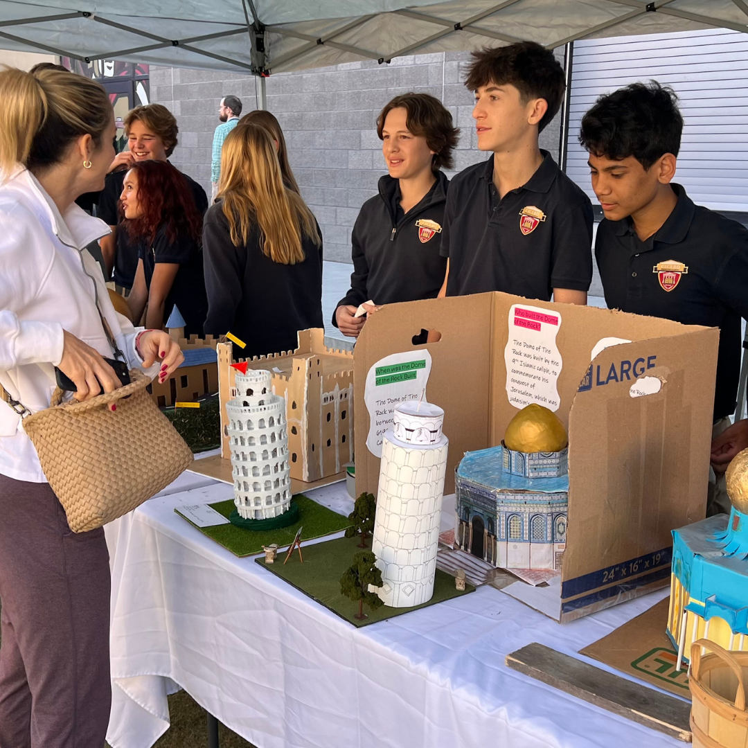 Students displaying their architectural projects.