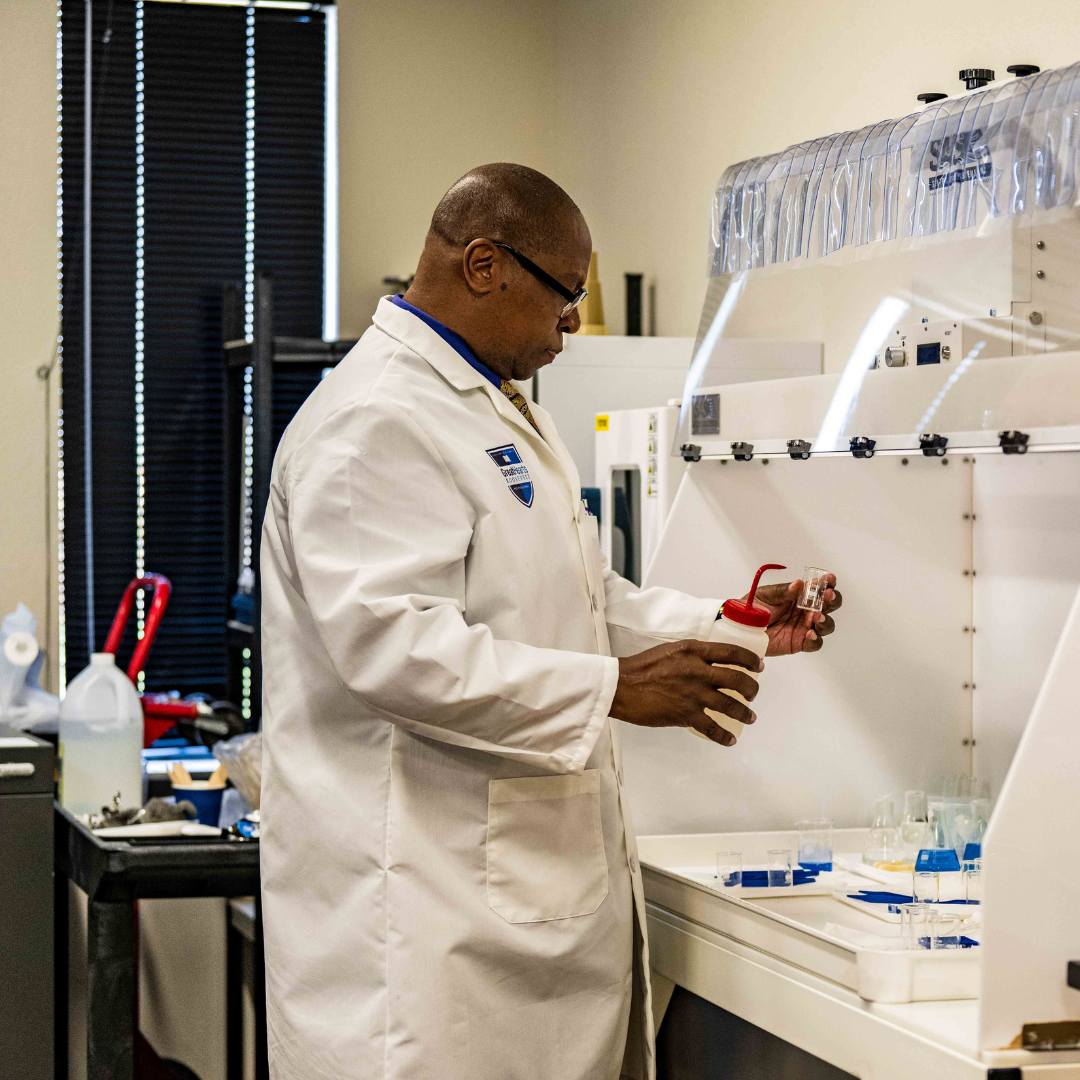 Teacher performing a science experiment